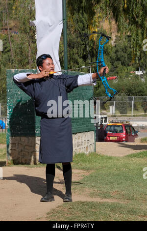 An archer taking aim during an archery competition. Thimphu, Bhutan. Stock Photo