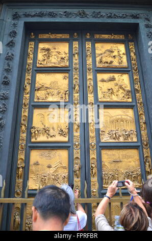 Outstanding Golden Gates of Paradise by Lorenzo Ghiberti in Baptistery of San Giovanni in Florence, Italy Stock Photo