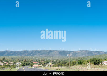 COOKHOUSE, SOUTH AFRICA - FEBRUARY 19, 2016: Wind generators line the mountains above Cookhouse, a small town in the Eastern Cap Stock Photo