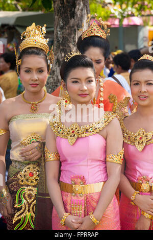 Beautiful Thai women in Thai traditional costume perform Thai dance