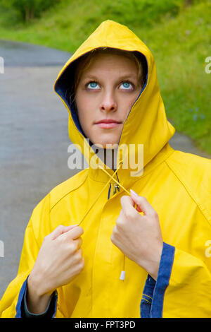 Young woman in the rain Stock Photo