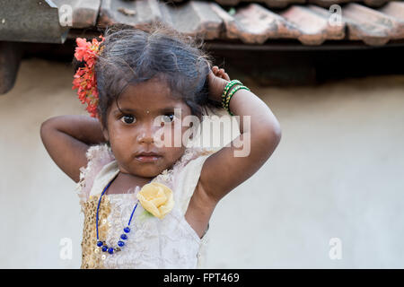 Indian slum girl wearing a flower in hair Stock Photo