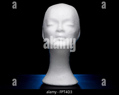 White dummy female head on black background Stock Photo