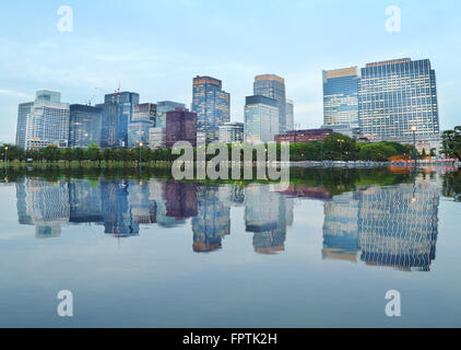 modern buildings with water reflection in Tokyo city, Japan Stock Photo