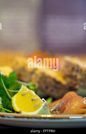 Extreme selective focus image of a lemon slice in a salad Stock Photo
