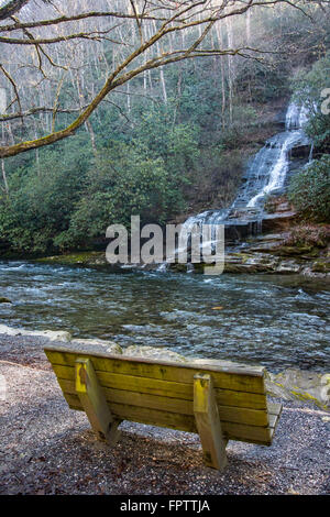 Bench looking out over creek and Tom Branch waterfall Stock Photo