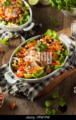 Homemade Mexican Chicken Burrito Bowl with Rice and Beans Stock Photo