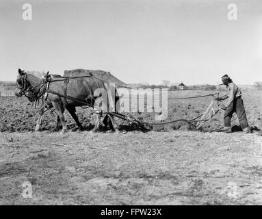 1930s NATIVE AMERICAN INDIAN MAN FARMER WALKING ROAD CARRYING FARM TOOL ...