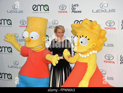 LOS ANGELES, CA - OCTOBER 24, 2015: Simpson's voice actress Yeardley Smith & Bart Simpson & Lisa Simpson characters at the 25th Annual Environmental Media Awards at Warner Bros. Studios, Burbank, CA. Stock Photo