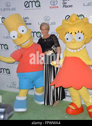 LOS ANGELES, CA - OCTOBER 24, 2015: Simpson's voice actress Yeardley Smith & Bart Simpson & Lisa Simpson characters at the 25th Annual Environmental Media Awards at Warner Bros. Studios, Burbank, CA. Stock Photo