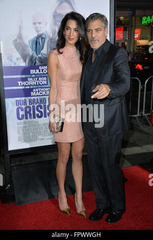 LOS ANGELES, CA - OCTOBER 26, 2015: Producer George Clooney & wife Amal Alamuddin at the Los Angeles premiere of his movie 'Our Brand is Crisis' at the TCL Chinese Theatre, Hollywood. Stock Photo