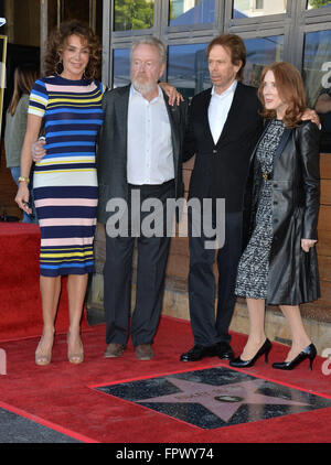 LOS ANGELES, CA - NOVEMBER 5, 2015: Director Ridley Scott & partner Giannina Facio with producer Jerry Bruckheimer & wife Linda on Hollywood Boulevard where he was honored with the 2,564th star on the Hollywood Walk of Fame. Stock Photo