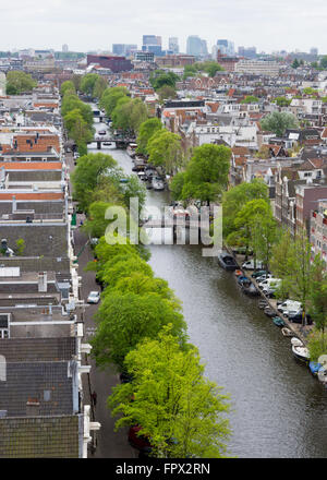 Tree lined canal in Amsterdam city from above Stock Photo