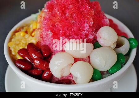 Ais Kacang (ABC), a colorful Malaysian dessert made of shaved ice Stock ...