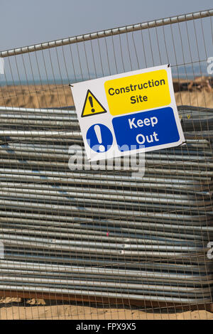 Construction Site Keep Out sign at Bournemouth beach during beach replenishment works in March - Bournemouth, Dorset UK Stock Photo