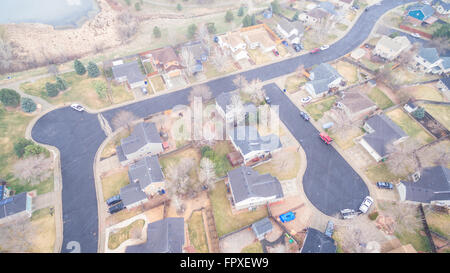 Aerial view of residential neighborhood at the beginning of snow storm. Stock Photo
