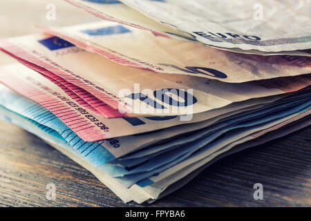 Several hundred euro banknotes stacked by value. Euro money concept. Euro banknotes. Euro currency. Stock Photo