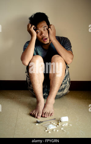 Young man mania from drug addiction Stock Photo