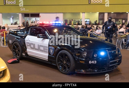 Birmingham, UK. 19th March, 2016. MCM Birmingham Comic Con, Cosplayers from all over the country come to display thier cosplay characters.Cars from the transformers Credit:  Scott Carruthers/Alamy Live News Stock Photo