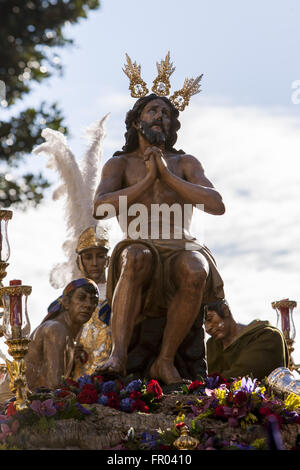 Seville, Spain. 20th Mar, 2016. The image of Jesus Christ of ''Las Penas'', of the Brotherhood called ''La Estrella'', begins its parade to Cathedral on Sunday of Palms, day called Domingo de Ramos in Spanish. © Daniel Gonzalez Acuna/ZUMA Wire/Alamy Live News Stock Photo