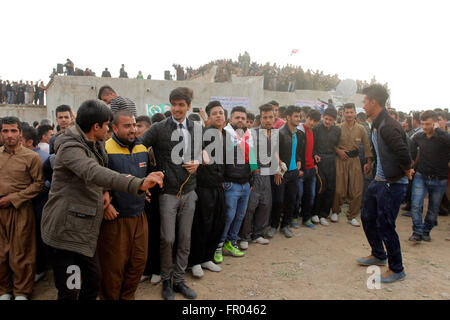 Kirkuk, Hundreds of Kurdish families flocked to public parks in the Iraqi northern city of Kirkuk to celebrate the ancient holiday Nowruz. 20th Mar, 2016. Kurdish people gather to celebrate Nowruz in Kirkuk, Iraq on March 20, 2016. Hundreds of Kurdish families flocked to public parks in the Iraqi northern city of Kirkuk to celebrate the ancient holiday Nowruz, marking the start of the Kurdish New Year on March 20, 2016. © Ako Zangana/Xinhua/Alamy Live News Stock Photo