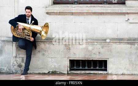 Oviedo, Spain. 20th March, 2016. A young man with a tuba during the celebration of Palm Sunday, that commemorates Jesus' triumphal entry into Jerusalem, on March 20, 2016 in Oviedo, Spain. Credit:  David Gato/Alamy Live News Stock Photo