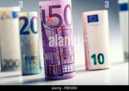 Several hundred euro banknotes stacked by value. Euro money concept. Rolls Euro  banknotes. Euro currency. Announced cancellatio Stock Photo