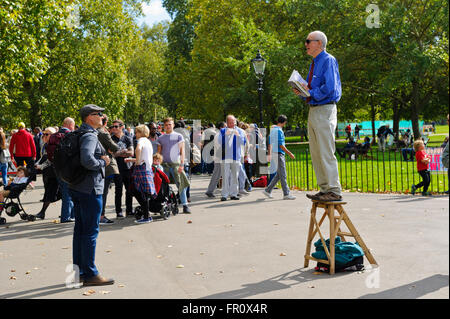 A man addressing the crowd at Speakers' Corner in Hyde Park, London, United Kingdom. Stock Photo