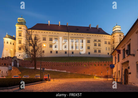 Evening on Kanonicza street in Krakow old town, Poland. Wawel Castle in the distance. Stock Photo