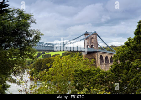 Menai bridge crossing Menai Straits to Anglesey from the mainland in Wales, UK, designed by Thomas Telford Stock Photo