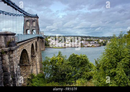 Menai bridge crossing Menai Straits to Anglesey from the mainland in Wales, UK, designed by Thomas Telford Stock Photo