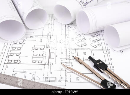 Confusing Blueprints Rolls of blueprints with dividers and ruler. Building concept Stock ...