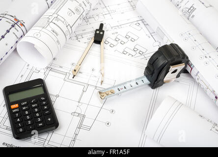 Architecture plan and rolls of blueprints with meter. Building concept ...