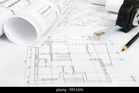 Architecture plan and rolls of blueprints with meter. Building concept ...