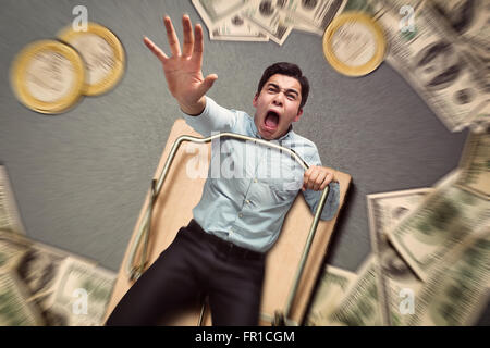 Man in a mouse trap falling Stock Photo