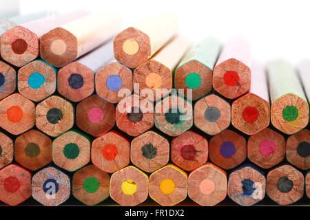 Colorful color pencil arranged in diagonal line on white background. Stock Photo