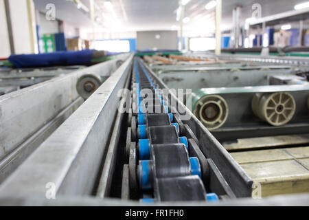 Chain Support for Pallet Conveyor line. Stock Photo