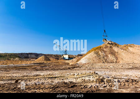the quarry of blue clay in a cloudless summer day Stock Photo