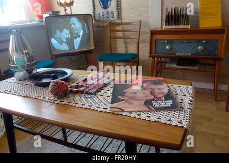 Mid 60es Swedish middle class sitting room with B&W TV and radio receiver set.  Interior design. Stock Photo