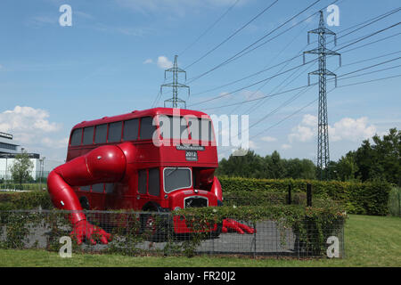 Art installation London Booster (2012) created by Czech visual artist David Cerny seen parked in Chodov district in Prague, Czech Republic. Famous art installation London Booster was created by David Cerny from a 1957 London double-decker bus for the 2012 Summer Olympics in London, UK. Stock Photo