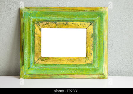 Image of green vintage mockup frame with gilded details. Stock Photo
