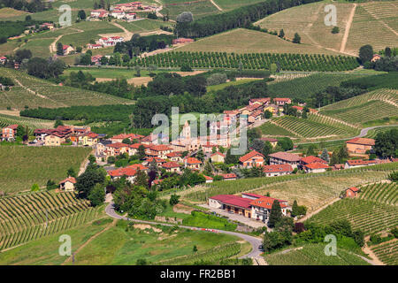 Small town among green hills of Piedmont, Northern Italy.