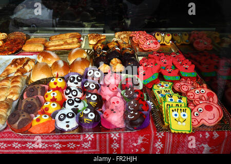 Biscuits and cakes on display in window of confectionery shop, Bilbao, Basque Country, Spain Stock Photo