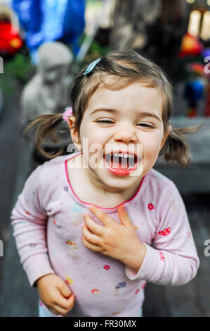 LOS ANGELES, CA – May 21: 3 year old caucasian girl laughing in Los Angeles, California on May 21, 2004. Stock Photo