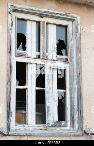 Old broken window closeup. Stock Photo