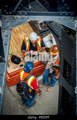 Workers on construction site having a lunch break, New York city, USA. Stock Photo