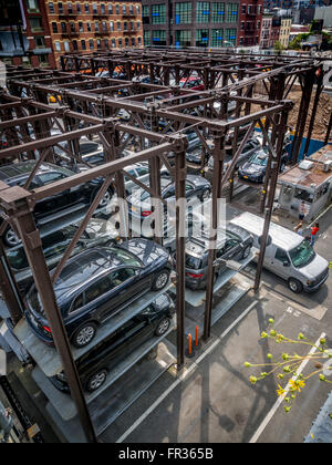 Stacked parking on steel racking - car park, New York City, USA. Stock Photo