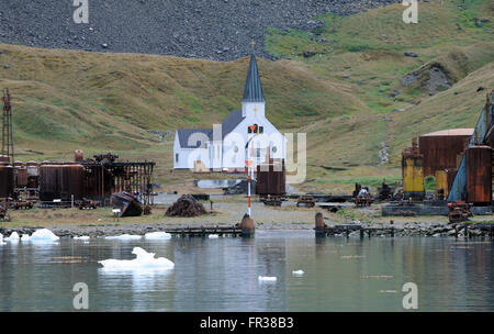 The Norwegian Lutheran Church stands among the rusting ruins of the whaling station. Grytviken, South Georgia Stock Photo