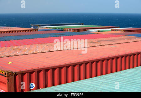 Shipping containers stacked at the prow of CC Corte Real container ship as it sails from Port Kelang to Southampton. Stock Photo