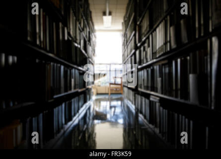 Blurred background of workplace at university library. Stock Photo